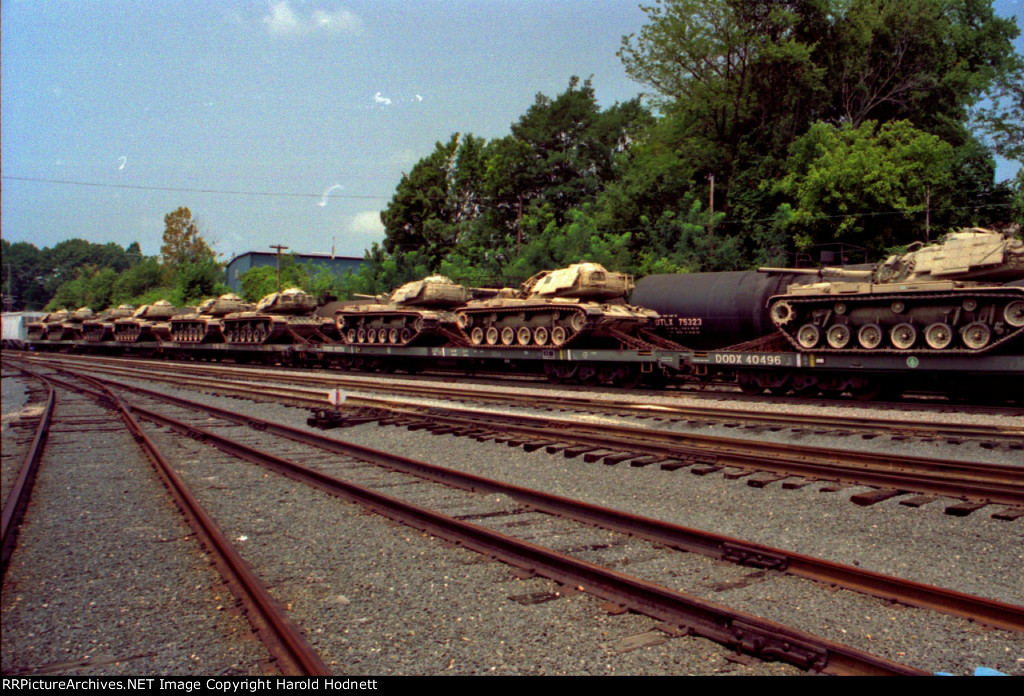 A line of DOD heavy duty flats with tanks